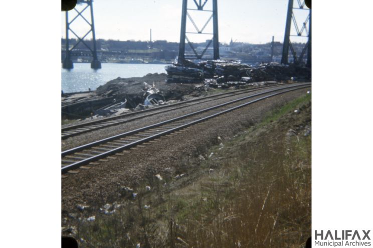Archive photo: Industrial debris below the Macdonald Bridge, pre-NIP — May 1977. Halifax Municipal Archives.